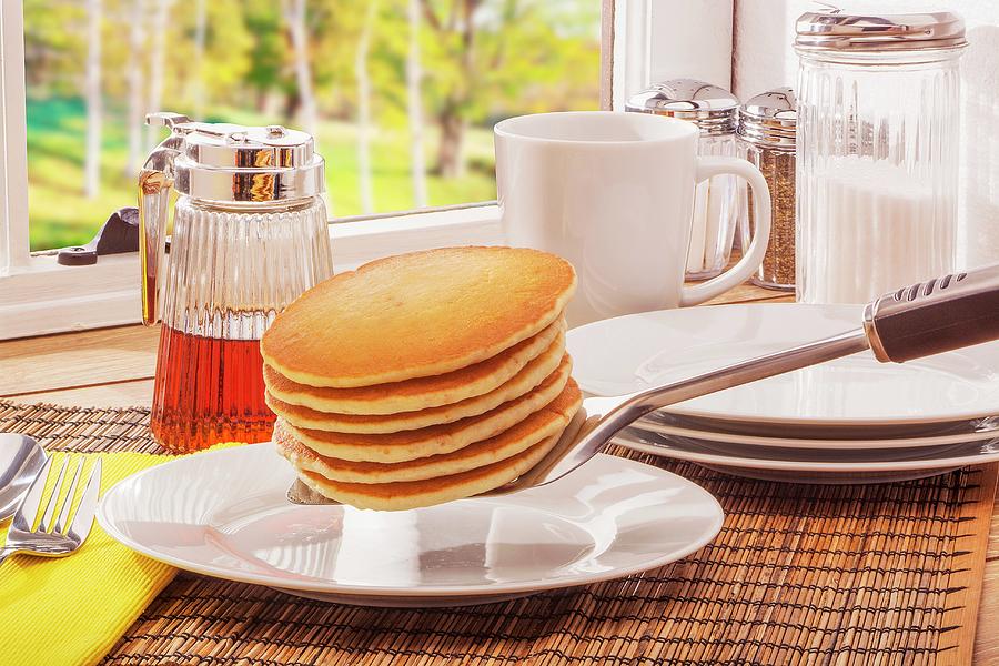 Buttermilk Pancakes And Maple Syrup On A Table Next To A Window Photograph by Brian Enright