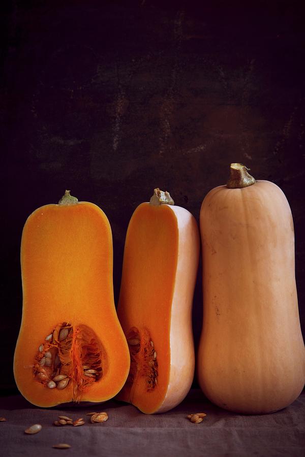 Butternut Squashes, Whole And Halved Photograph by Eising Studio