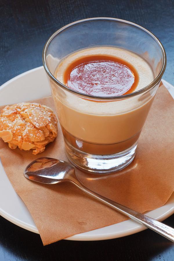 Butterscotch Pudding With An Almond Biscuit Photograph by Chuck Place