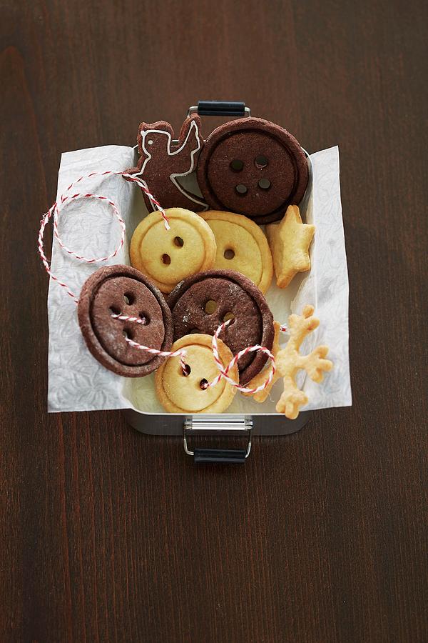 Button Biscuits In A Tin Photograph by Rafael Pranschke