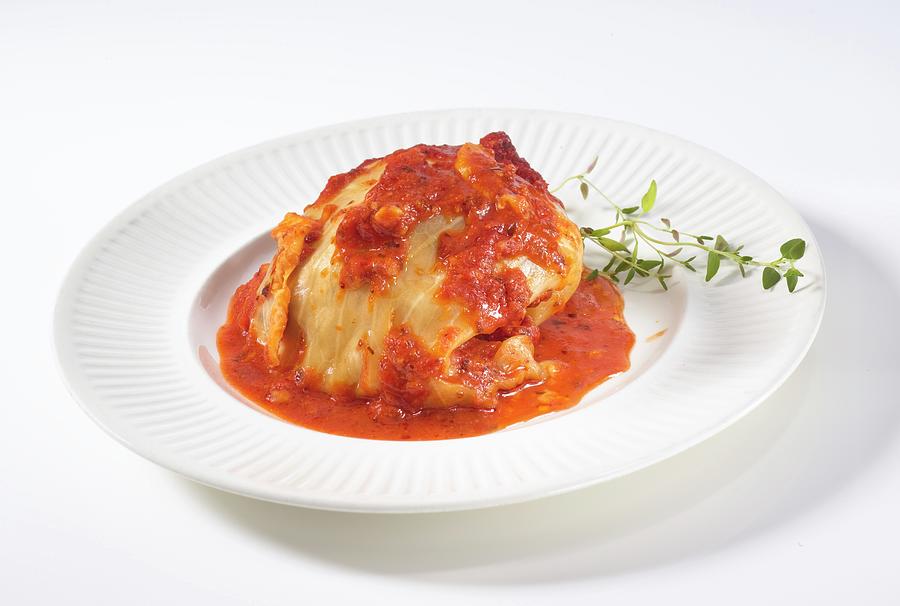 Cabbage Roulade With Tomato Sauce Photograph by Glenn Moores