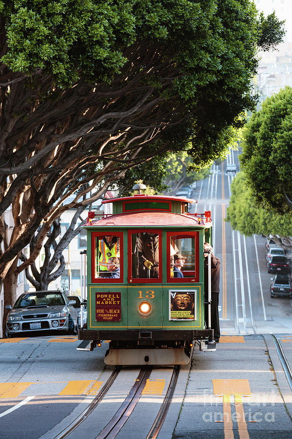 Cable car on the hills of San Francisco, California, USA Photograph by Matteo Colombo