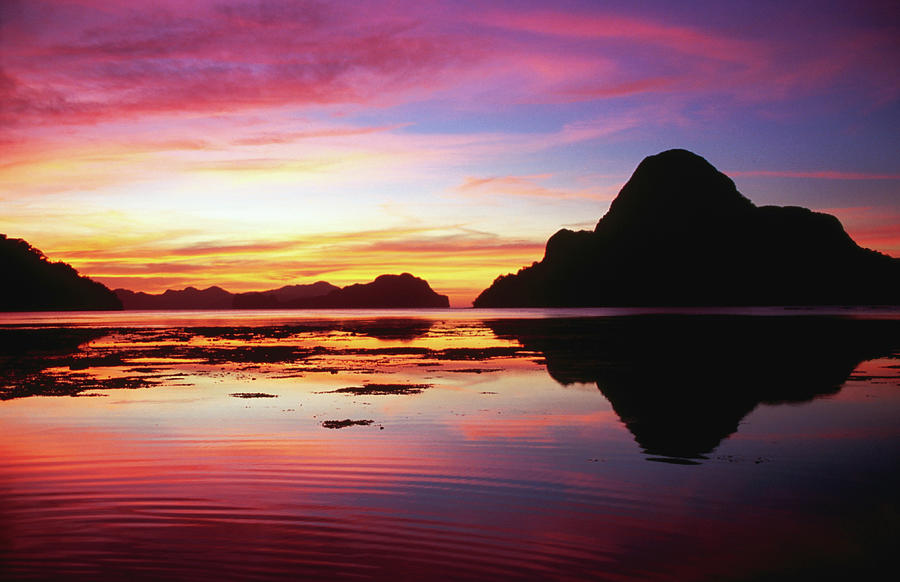 Cadlao Island Silhouetted At Sunset Photograph by Dallas Stribley Cadlao Island Silhouetted At Sunset Photograph by Dallas Stribley