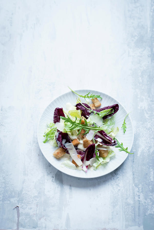 Caesar Salad On A White Plate, White Background Photograph by Manuela Rther