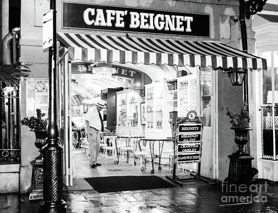 Cafe Beignet at Night in New Orleans Photograph by John Rizzuto
