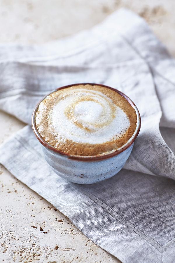 Caffe Latte In A Ceramic Cup Photograph by B.&.e.dudzinski
