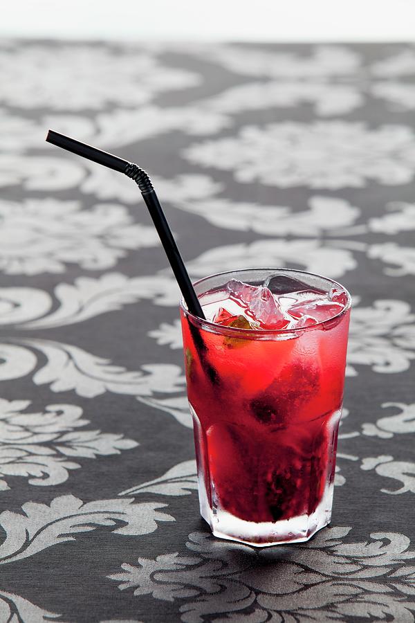 Caipirinha With Blackberries And Basil Photograph by Giannis Agelou