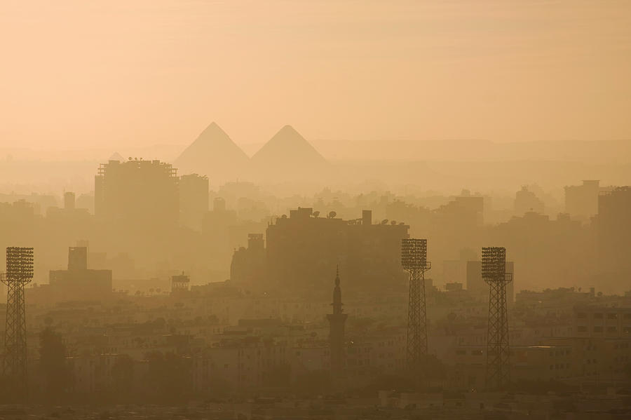 Cairo Skyline And The Pyramids On Dusty Photograph by Matt Champlin