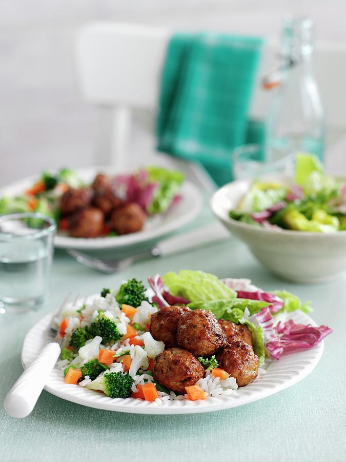 Cajun Meatballs With Vegetable Rice Photograph by Gareth Morgans