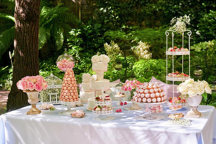 Cake Buffet For A Wedding In A Garden Photograph by Bernhard Winkelmann
