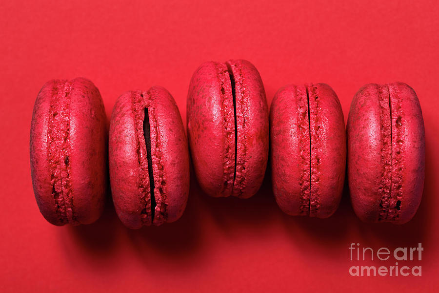 Cake Macaroons On Red Background Photograph by Viktoria Ovcharenko