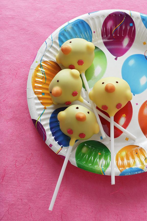 Cake Pops chicks On A Colourful Paper Plate Photograph by Kröger ...