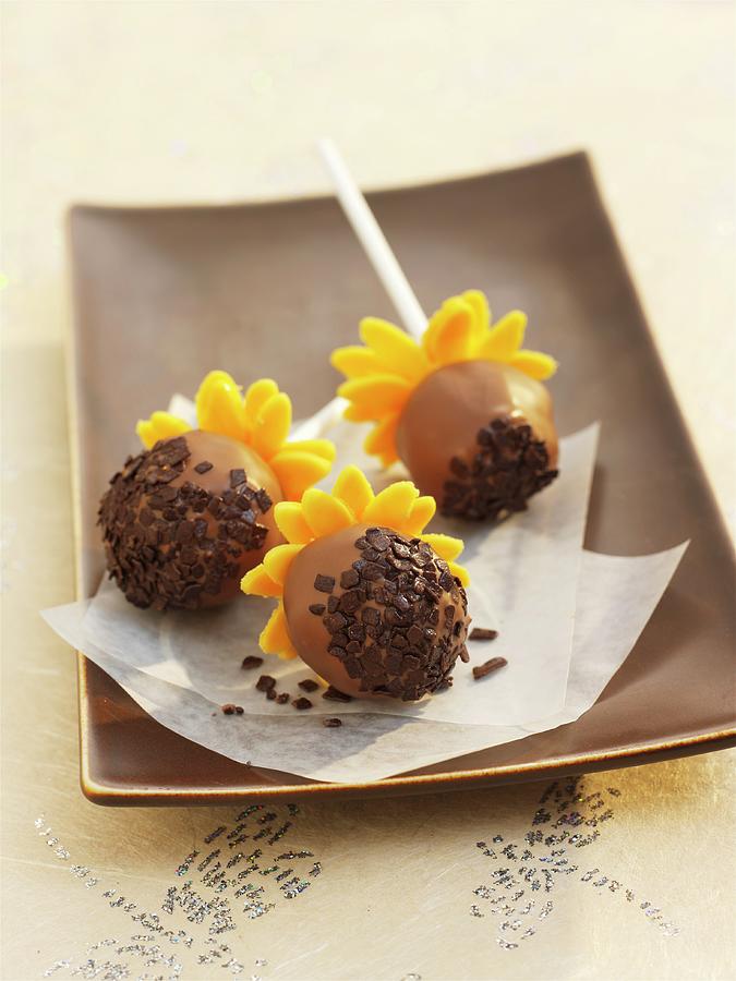 Cake Pops Decorated To Look Like Sunflowers Photograph by Garlick, Ian