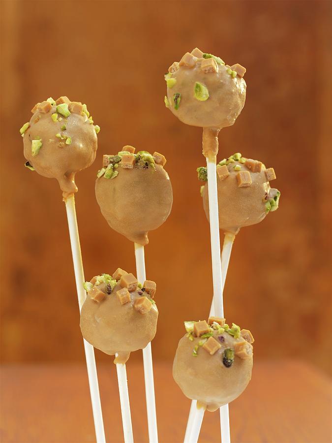 Cake Pops With Butterscotch And Pistachio Photograph by Garlick, Ian