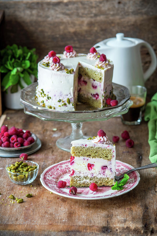 Cake With Pistachio Sponges, Baked Raspberry Cheesecake Layer And Raspberry Cream Cheese Photograph by Irina Meliukh