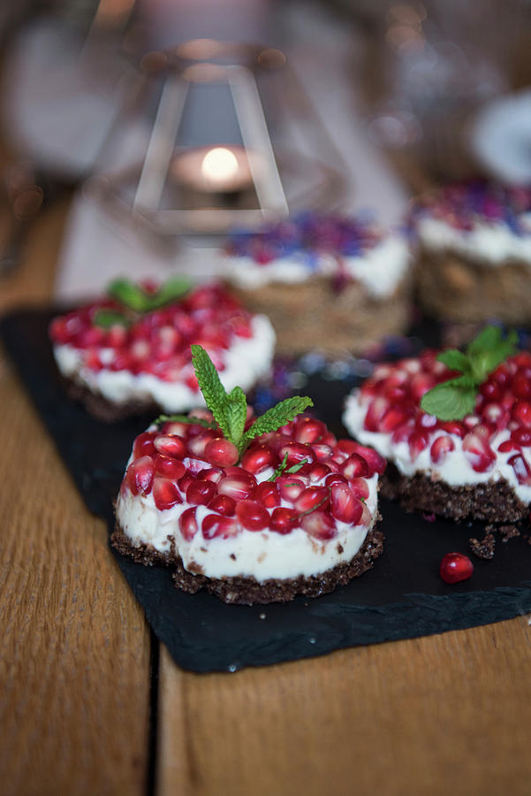 Cake With Pomegranate And Coconut Blossom Sugar Photograph by Jelena Filipinski