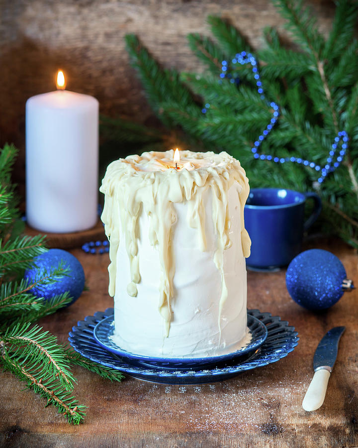 Cake With Sour Cream And White Chocolate Resembling Candle Photograph by Irina Meliukh