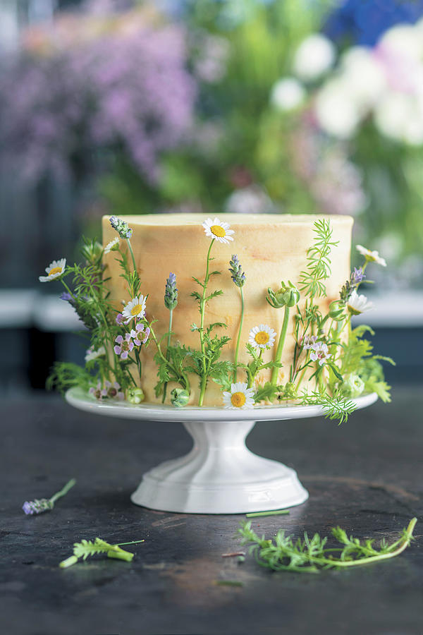 Cake With White Chocolate Icing And Edible Flowers Photograph by Great Stock!