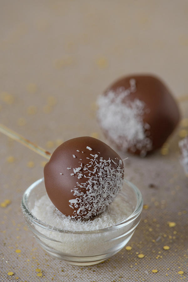 Cakepops With Chocolate Icing And Grated Coconut Photograph by Joanna Stolowicz