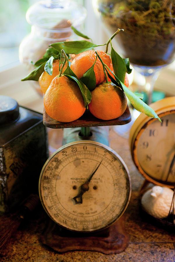 California Clementines On An Antique Scale Photograph by William Boch