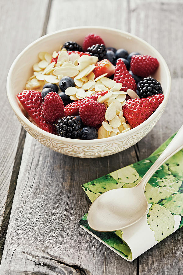 Californian Porridge With Fresh Berries And Flaked Almonds Photograph by Tre Torri