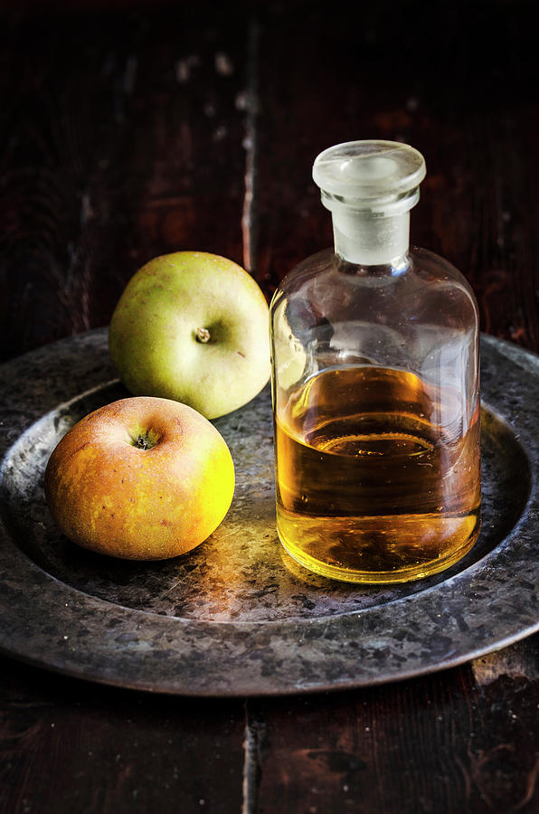 Calvados With Two Apples Photograph by Aniko Szabo