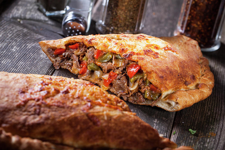 Calzone With Meat And Peppers Photograph by Theodosis Georgiadis