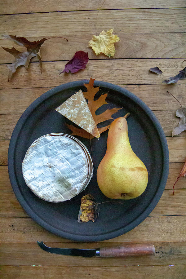 Camembert And Pear On A Plate Photograph by Patricia Miceli
