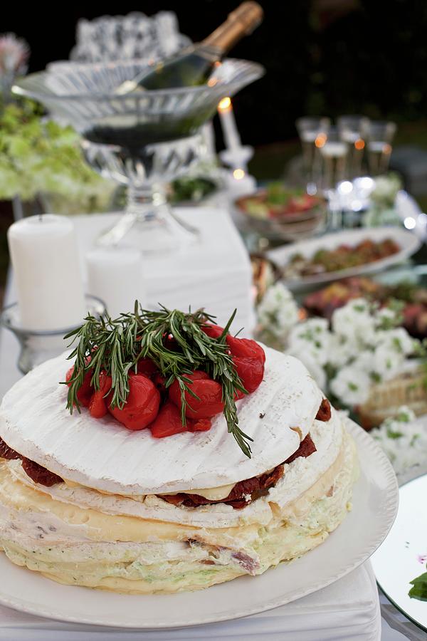 Camembert Cake With Tomato Peppers And Rosemary On A Buffet Table Photograph by Great Stock!