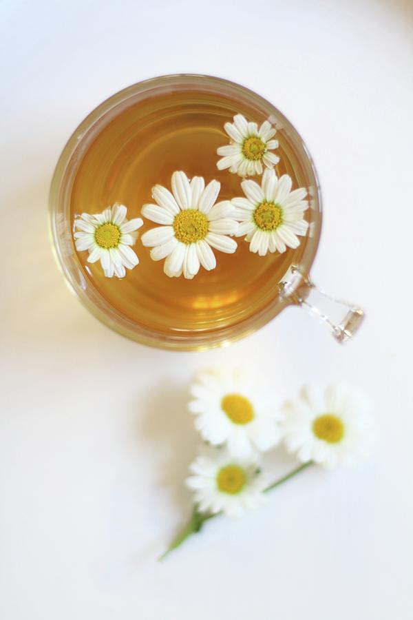 Camomile Tea In A Glass Cup seen From Above Photograph by Sylvia E.k Photography