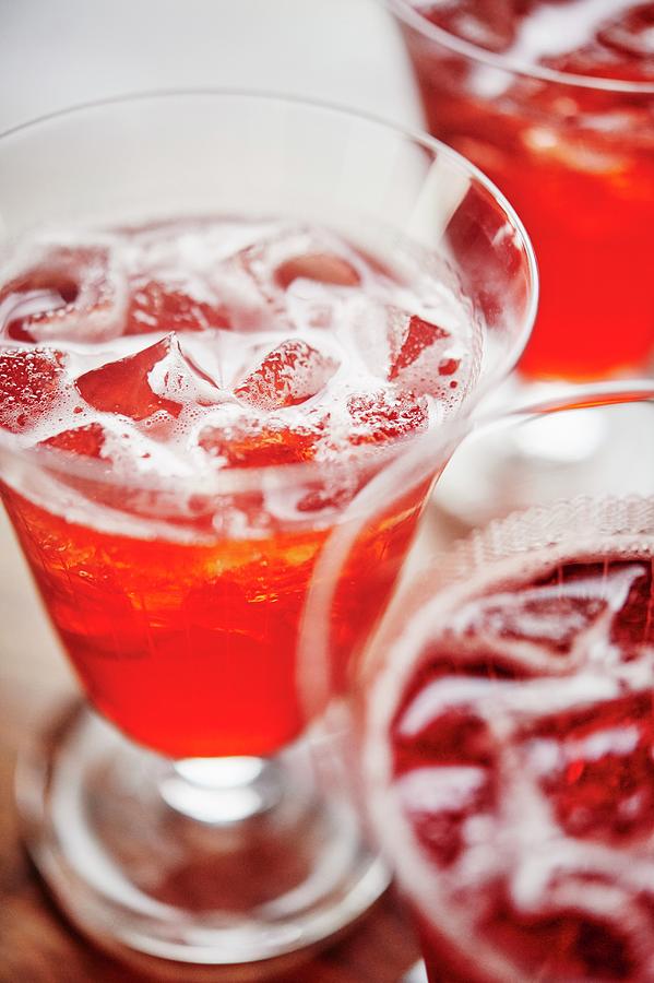 Campari Cocktail With Ice Cubes Photograph by Greg Rannells