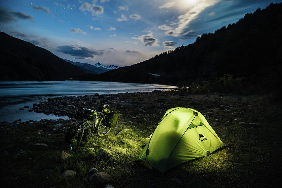 Camping along a river in Chilean Patagonia Photograph by Kamran Ali