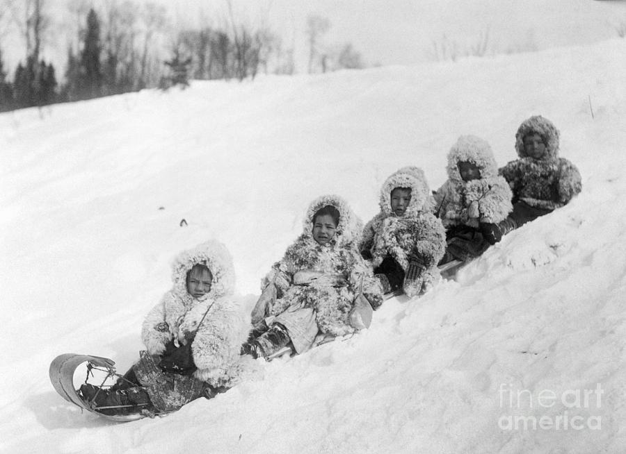 Canadian Indian Children On Sled Photograph by Bettmann