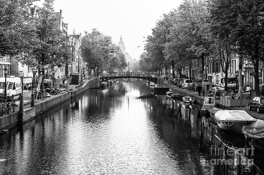 Canal Glow in Amsterdam Photograph by John Rizzuto