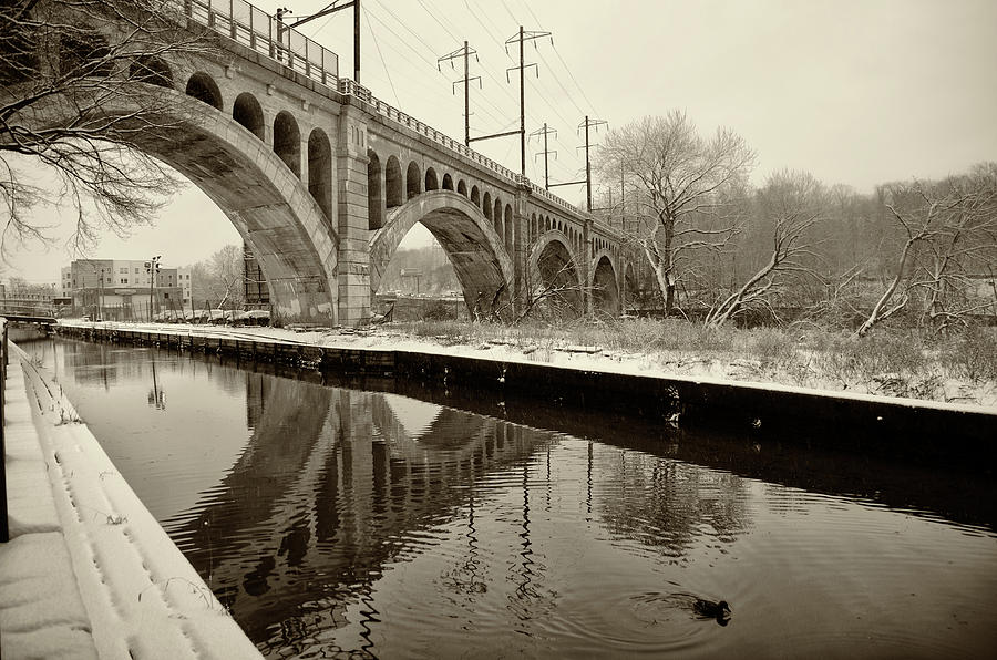 Canal Scene in Winter - Manayunk in Sepia Photograph by Bill Cannon