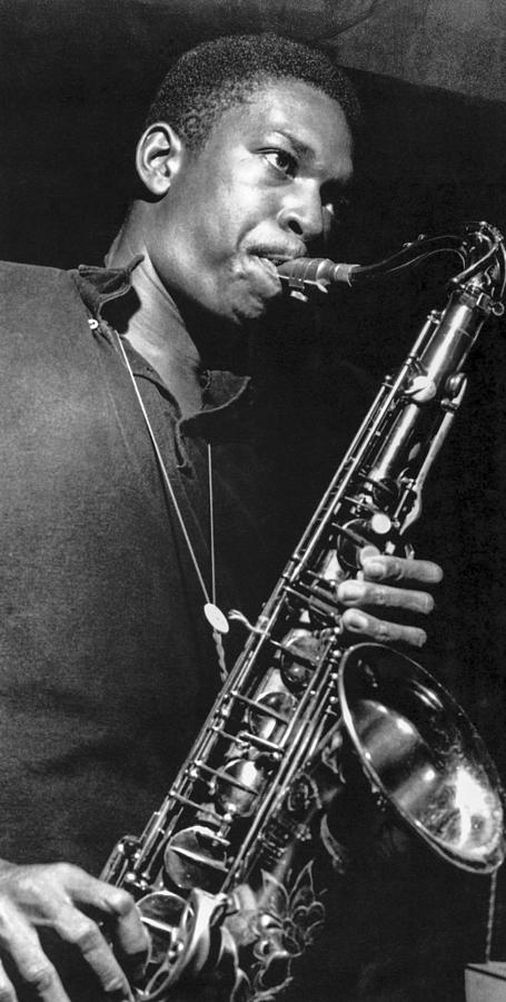 Candid Portrait Of John Coltrane Playing Saxophone Photograph by Globe ...