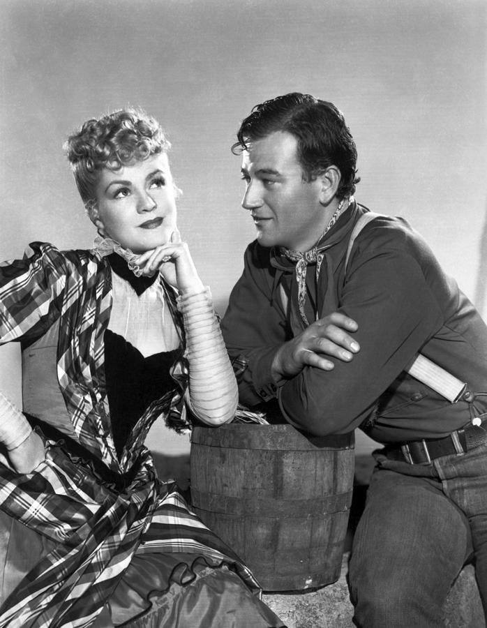 Candid Portrait Of John Wayne And Claire Trevor In 'stagecoach ...