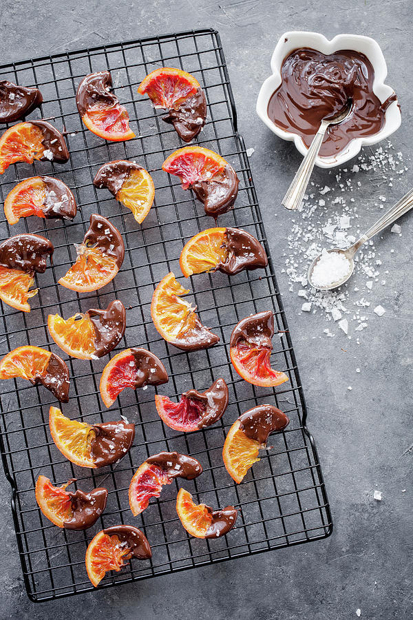Candied Blood Oranges Dipped In Chocolate And Sprinkled With Finger Salt Photograph by Kati Finell