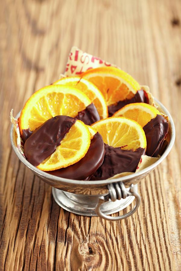 Candied Orange Slices Dipped In Chocolate, For Christmas Photograph by Rua Castilho