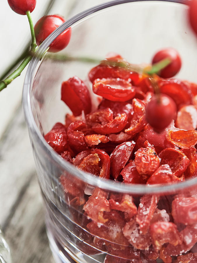 Candied Rosehips In A Glass Photograph by Hannah Kompanik