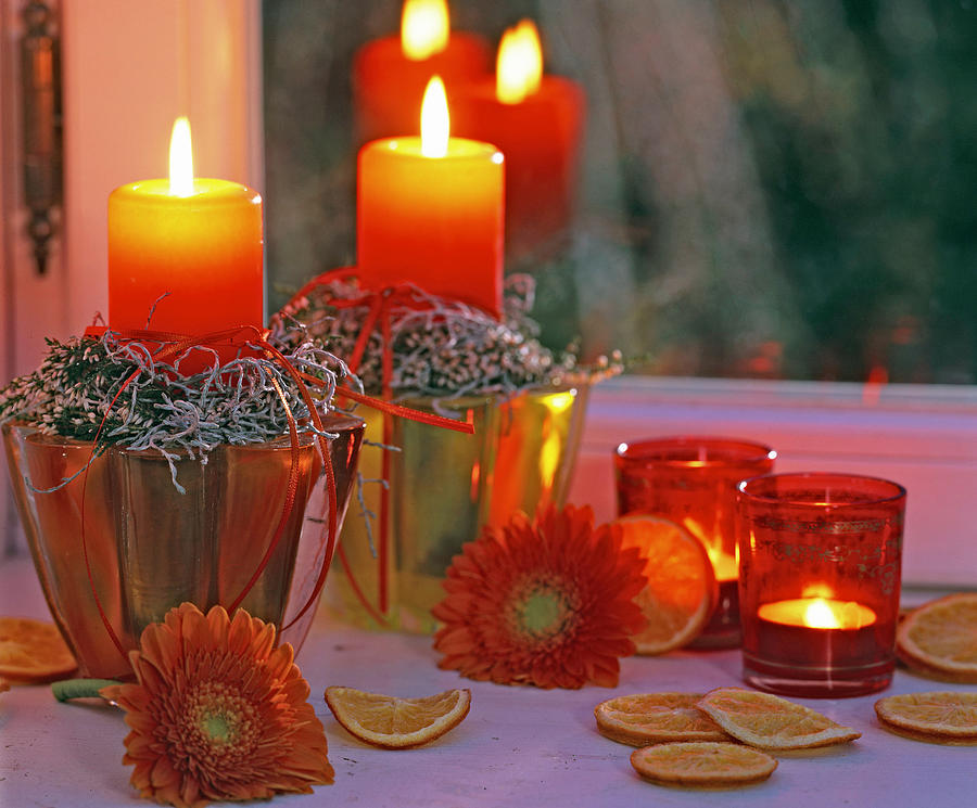 Candle Decoration With Heather, Gerberas & Orange Slices Photograph by Friedrich Strauss