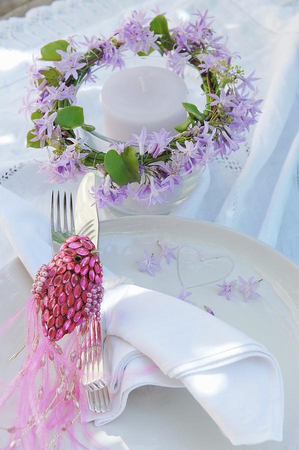 Candle Lantern Decorated With Wreath Of Purple Flowers And Bird Ornament Made From Glittering Pink Beads On Place Setting Photograph by Twins
