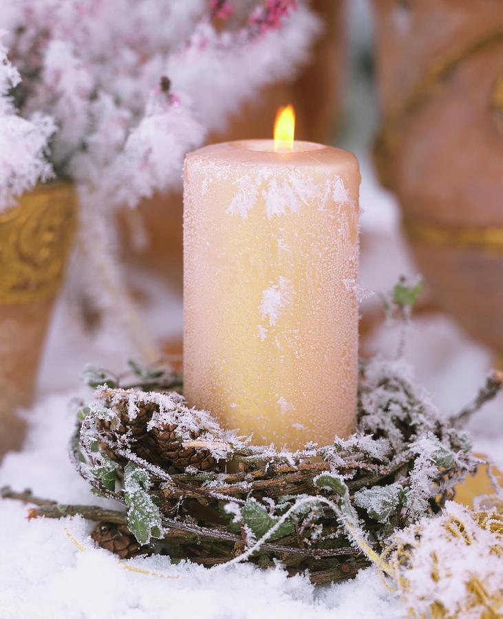 Candle With Wreath Of Larch Twigs Photograph by Friedrich Strauss