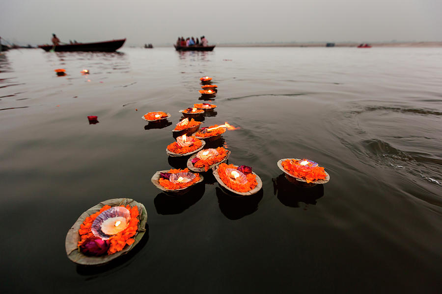 Candles Floating In The Ganges River Photograph by Mint Images/ Art Wolfe