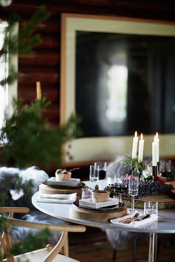 Candles On Table Festively Set For Christmas Photograph by Birgitta Wolfgang Bjornvad