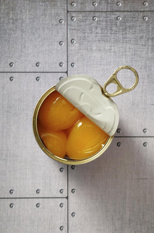 Canned Peaches Photograph by Jean-christophe Riou