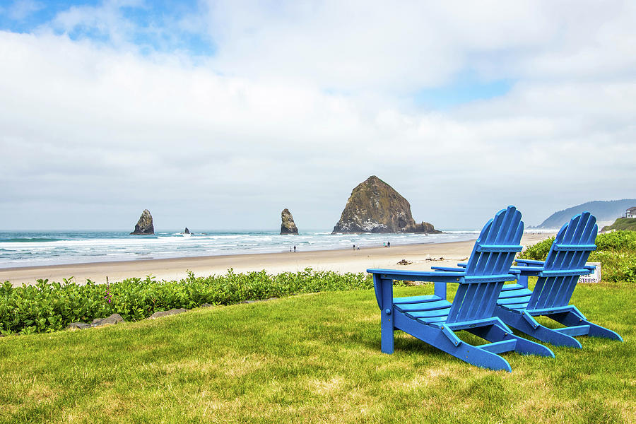 Cannon Beach and The Haystack Rock Photograph by Jordan Hill