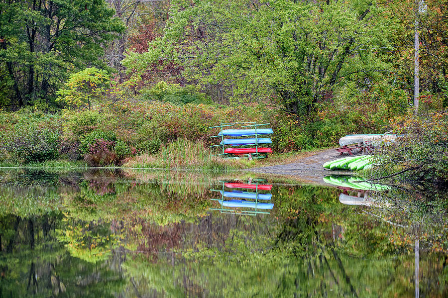 Canoe for rent Photograph by Paul Freidlund