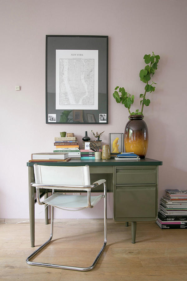 Cantilever Chair And Old Desk Against Pink Wall Photograph by Ilaria Chiaratti