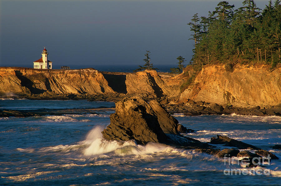 Cape Arago Lighthouse At Sunset Oregon Photograph by Dave Welling
